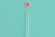 Ladder leading up to a red-and-white bull’s eye