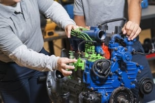 Student and instructor working on hands-on project